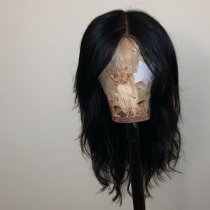Black wig with blonde highlights